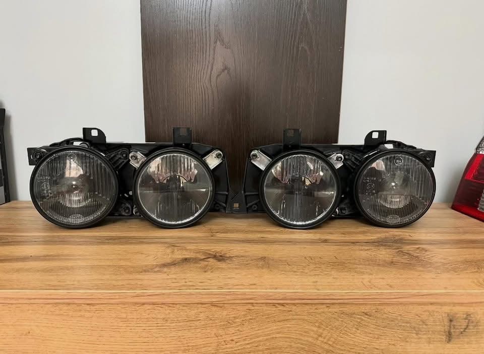 Phares avant Hella Black d’origine pour BMW E34 / E32